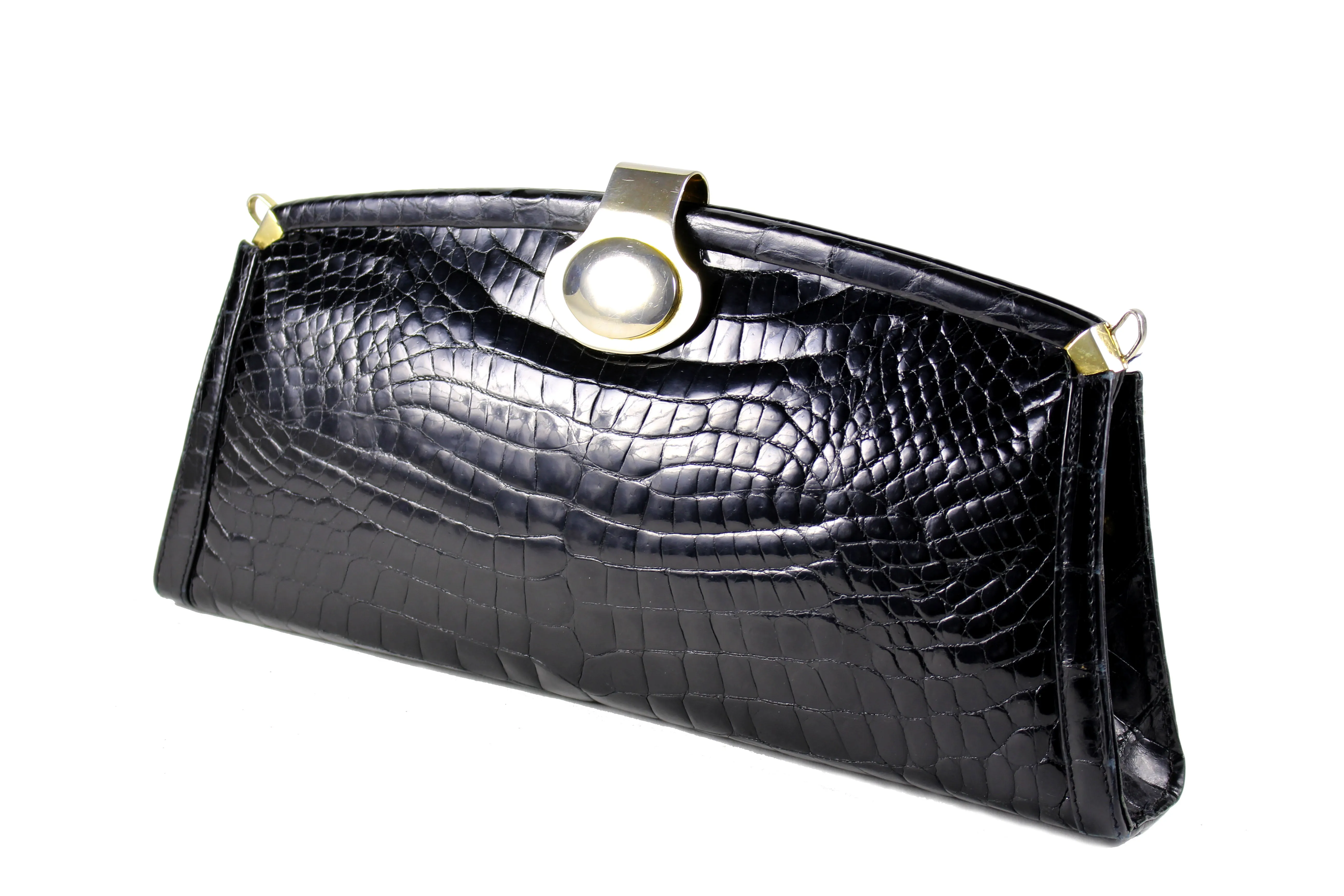 Black crocodile skin clutch with decorative brooch