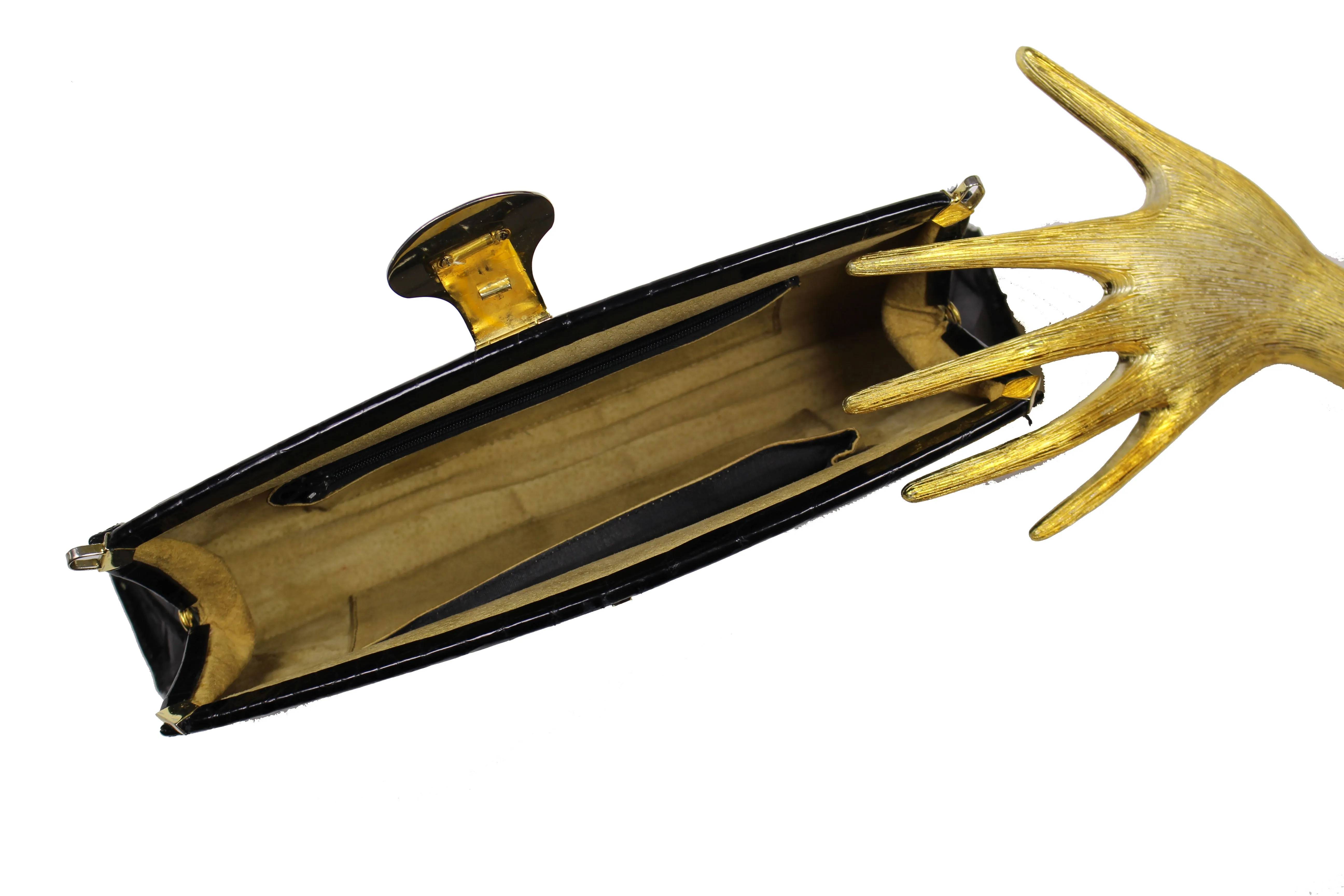 Black crocodile skin clutch with decorative brooch